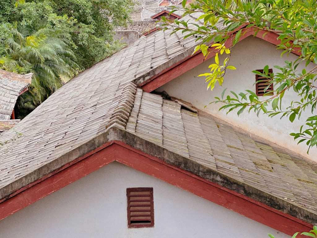 house with roofing issues